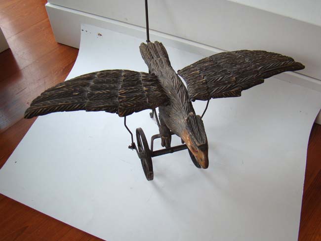 A late Victorian carved wooden spread wing eagle push toy — image 5